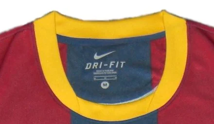 Yellow collar detail · crop of the same 2010/11 shirt photograph